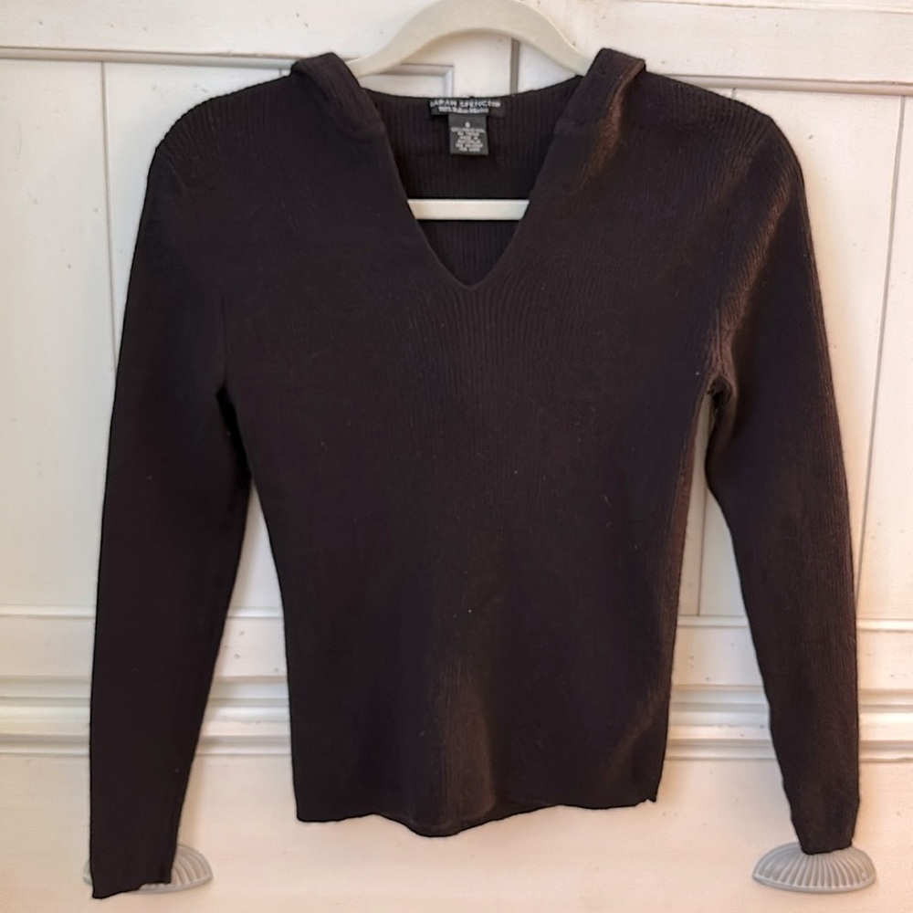100% Italian Merino Wool hooded sweater.